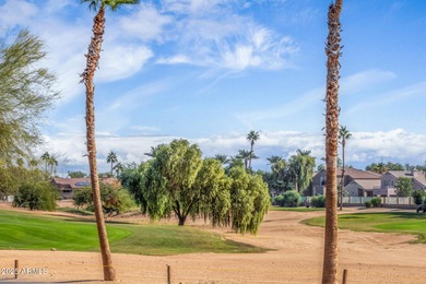 Gated community living at its best! This 4-bedroom, 2-bath home on Palm Valley Golf Club  in Arizona - for sale on GolfHomes.com, golf home, golf lot