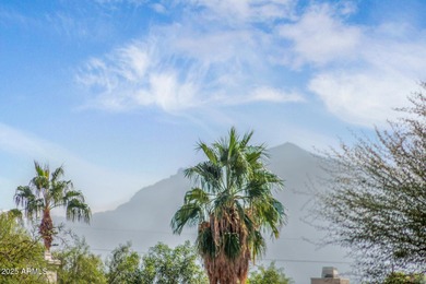 Gated community living at its best! This 4-bedroom, 2-bath home on Palm Valley Golf Club  in Arizona - for sale on GolfHomes.com, golf home, golf lot