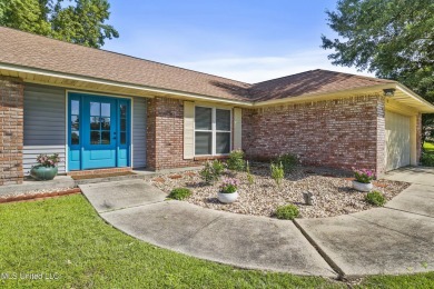 Move-in ready home in the highly sought-after Diamondhead golf on Diamondhead Country Club in Mississippi - for sale on GolfHomes.com, golf home, golf lot