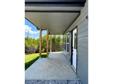 This stunning, brand new ranch home, boasting 3 bedrooms and 2 on Linn Valley Lakes - Deer Trace Golf Course in Kansas - for sale on GolfHomes.com, golf home, golf lot