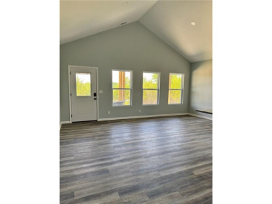 This stunning, brand new ranch home, boasting 3 bedrooms and 2 on Linn Valley Lakes - Deer Trace Golf Course in Kansas - for sale on GolfHomes.com, golf home, golf lot