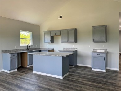 This stunning, brand new ranch home, boasting 3 bedrooms and 2 on Linn Valley Lakes - Deer Trace Golf Course in Kansas - for sale on GolfHomes.com, golf home, golf lot