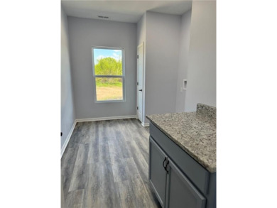 This stunning, brand new ranch home, boasting 3 bedrooms and 2 on Linn Valley Lakes - Deer Trace Golf Course in Kansas - for sale on GolfHomes.com, golf home, golf lot