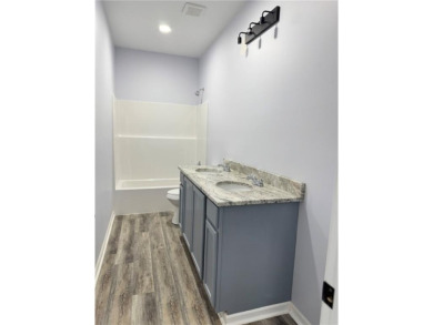 This stunning, brand new ranch home, boasting 3 bedrooms and 2 on Linn Valley Lakes - Deer Trace Golf Course in Kansas - for sale on GolfHomes.com, golf home, golf lot