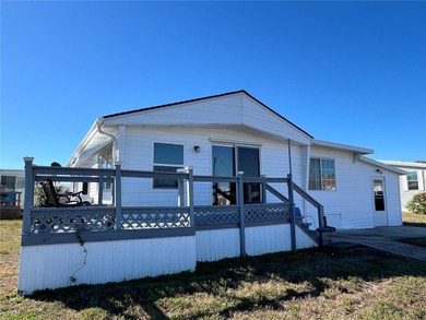 Affordable Saltwater Canal Waterfront Living with 40ft seawall on Mangrove Bay Golf Course in Florida - for sale on GolfHomes.com, golf home, golf lot