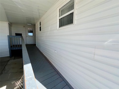 Affordable Saltwater Canal Waterfront Living with 40ft seawall on Mangrove Bay Golf Course in Florida - for sale on GolfHomes.com, golf home, golf lot