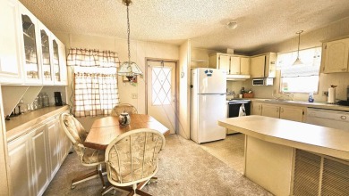 Welcome to your cozy retreat in the sought-after Golf Course on Blue Heron Pines Golf Course in Florida - for sale on GolfHomes.com, golf home, golf lot