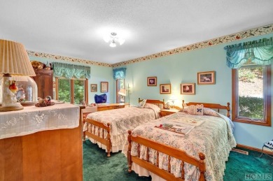 Remarkable golf course and mountain views from this immaculately on Lake Toxaway Country Club in North Carolina - for sale on GolfHomes.com, golf home, golf lot