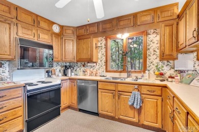 Remarkable golf course and mountain views from this immaculately on Lake Toxaway Country Club in North Carolina - for sale on GolfHomes.com, golf home, golf lot