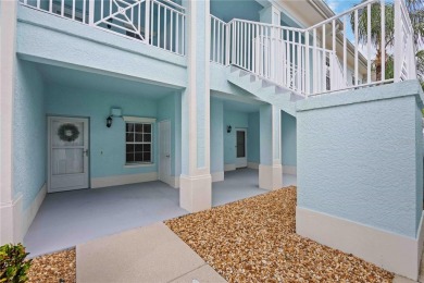 Enjoy waterfront living in this turnkey bright end-unit villa on Sabal Trace Golf and Country Club in Florida - for sale on GolfHomes.com, golf home, golf lot