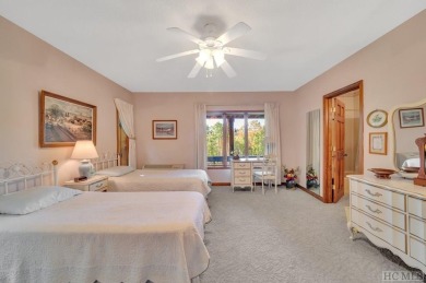 Remarkable golf course and mountain views from this immaculately on Lake Toxaway Country Club in North Carolina - for sale on GolfHomes.com, golf home, golf lot