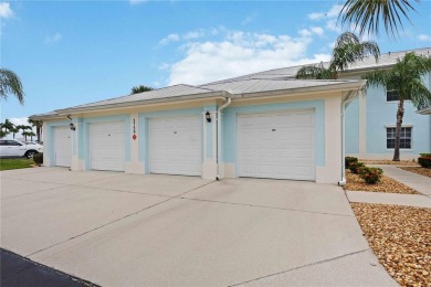 Enjoy waterfront living in this turnkey bright end-unit villa on Sabal Trace Golf and Country Club in Florida - for sale on GolfHomes.com, golf home, golf lot