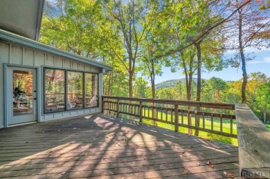 Remarkable golf course and mountain views from this immaculately on Lake Toxaway Country Club in North Carolina - for sale on GolfHomes.com, golf home, golf lot