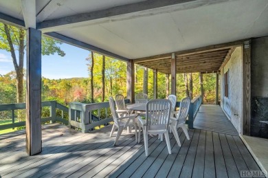 Remarkable golf course and mountain views from this immaculately on Lake Toxaway Country Club in North Carolina - for sale on GolfHomes.com, golf home, golf lot