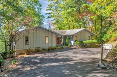 Remarkable golf course and mountain views from this immaculately on Lake Toxaway Country Club in North Carolina - for sale on GolfHomes.com, golf home, golf lot