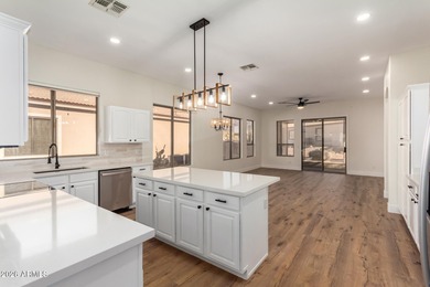 Fully remodeled and beautifully updated, this move-in ready home on Superstition Mountain Club - Lost Gold in Arizona - for sale on GolfHomes.com, golf home, golf lot