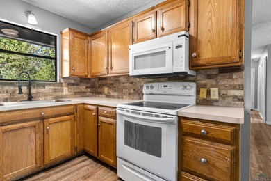 Charming Corner Lot Listed under Appraisal Value and nestled in on Holly Lake Ranch Golf Club in Texas - for sale on GolfHomes.com, golf home, golf lot