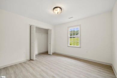 Welcome to this beautifully updated 3-bedroom, 2-bathroom home on River Falls Plantation in South Carolina - for sale on GolfHomes.com, golf home, golf lot