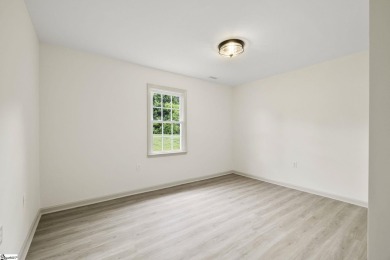 Welcome to this beautifully updated 3-bedroom, 2-bathroom home on River Falls Plantation in South Carolina - for sale on GolfHomes.com, golf home, golf lot