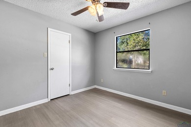 Charming Corner Lot Listed under Appraisal Value and nestled in on Holly Lake Ranch Golf Club in Texas - for sale on GolfHomes.com, golf home, golf lot