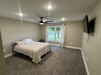 This home overlooks the pristine Lake Michigan Hills Golf Course on Lake Michigan Hills Golf Club in Michigan - for sale on GolfHomes.com, golf home, golf lot