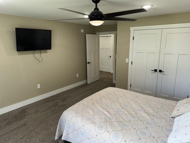 This home overlooks the pristine Lake Michigan Hills Golf Course on Lake Michigan Hills Golf Club in Michigan - for sale on GolfHomes.com, golf home, golf lot