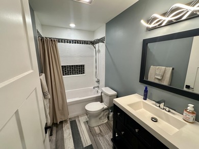 This home overlooks the pristine Lake Michigan Hills Golf Course on Lake Michigan Hills Golf Club in Michigan - for sale on GolfHomes.com, golf home, golf lot