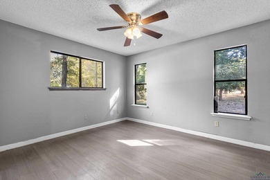 Charming Corner Lot Listed under Appraisal Value and nestled in on Holly Lake Ranch Golf Club in Texas - for sale on GolfHomes.com, golf home, golf lot