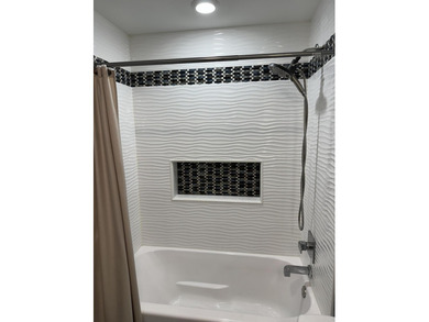 This home overlooks the pristine Lake Michigan Hills Golf Course on Lake Michigan Hills Golf Club in Michigan - for sale on GolfHomes.com, golf home, golf lot