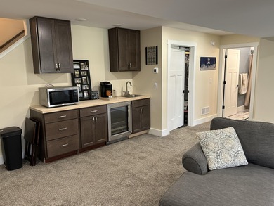 This home overlooks the pristine Lake Michigan Hills Golf Course on Lake Michigan Hills Golf Club in Michigan - for sale on GolfHomes.com, golf home, golf lot