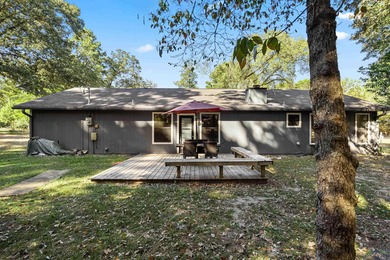 Charming Corner Lot Listed under Appraisal Value and nestled in on Holly Lake Ranch Golf Club in Texas - for sale on GolfHomes.com, golf home, golf lot