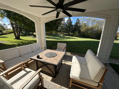 This home overlooks the pristine Lake Michigan Hills Golf Course on Lake Michigan Hills Golf Club in Michigan - for sale on GolfHomes.com, golf home, golf lot