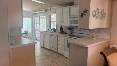 Discover your dream home! This stunning 3-bedroom, 2-bath oasis on Sabal Springs Golf and Racquet Club in Florida - for sale on GolfHomes.com, golf home, golf lot