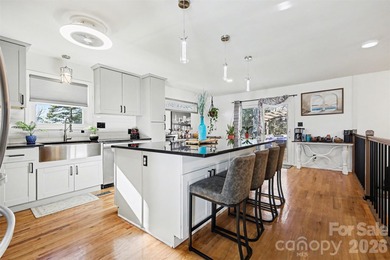 This charming split-level home offers a welcoming blend of on Tega Cay Golf Club in South Carolina - for sale on GolfHomes.com, golf home, golf lot