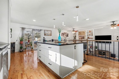 This charming split-level home offers a welcoming blend of on Tega Cay Golf Club in South Carolina - for sale on GolfHomes.com, golf home, golf lot