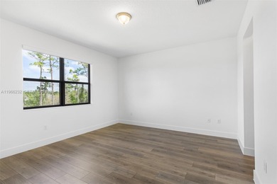 Built in 2024 and impeccably maintained, this stunning 3-bedroom on Panther Run Golf Club in Florida - for sale on GolfHomes.com, golf home, golf lot