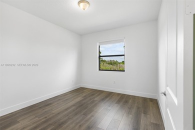 Built in 2024 and impeccably maintained, this stunning 3-bedroom on Panther Run Golf Club in Florida - for sale on GolfHomes.com, golf home, golf lot