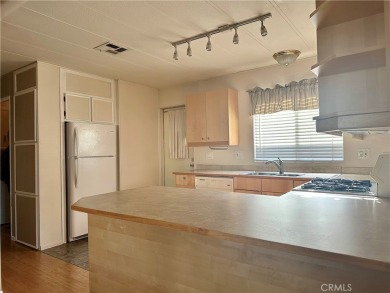 Tucked away in a quiet location backing to a serene hillside on Rolling Hills Country Club in California - for sale on GolfHomes.com, golf home, golf lot