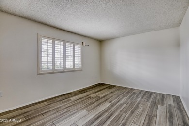 Welcome to this charming 2-bedroom, 2-bath home in Sun City on PalmBrook Country Club in Arizona - for sale on GolfHomes.com, golf home, golf lot