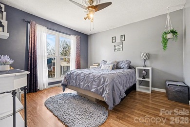 This charming split-level home offers a welcoming blend of on Tega Cay Golf Club in South Carolina - for sale on GolfHomes.com, golf home, golf lot