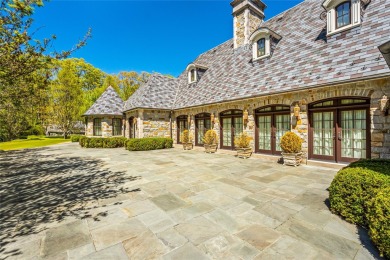 This grand, gated estate blends timeless elegance with modern on Tam O Shanter Golf Club, Inc. in New York - for sale on GolfHomes.com, golf home, golf lot