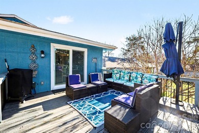 This charming split-level home offers a welcoming blend of on Tega Cay Golf Club in South Carolina - for sale on GolfHomes.com, golf home, golf lot