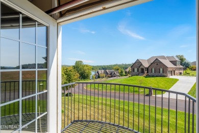 This golf front home on the 14th green is both elegant and on Rarity Bay Country Club - Loudon in Tennessee - for sale on GolfHomes.com, golf home, golf lot