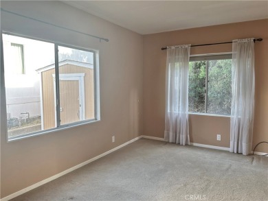 Tucked away in a quiet location backing to a serene hillside on Rolling Hills Country Club in California - for sale on GolfHomes.com, golf home, golf lot