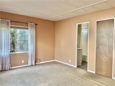 Tucked away in a quiet location backing to a serene hillside on Rolling Hills Country Club in California - for sale on GolfHomes.com, golf home, golf lot