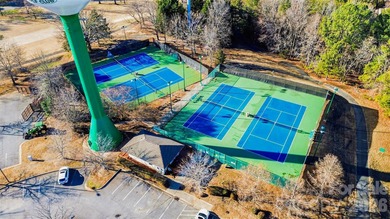 This charming split-level home offers a welcoming blend of on Tega Cay Golf Club in South Carolina - for sale on GolfHomes.com, golf home, golf lot