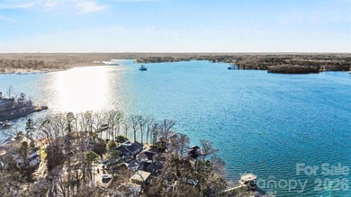 This charming split-level home offers a welcoming blend of on Tega Cay Golf Club in South Carolina - for sale on GolfHomes.com, golf home, golf lot
