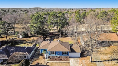 This charming split-level home offers a welcoming blend of on Tega Cay Golf Club in South Carolina - for sale on GolfHomes.com, golf home, golf lot