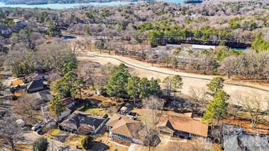 This charming split-level home offers a welcoming blend of on Tega Cay Golf Club in South Carolina - for sale on GolfHomes.com, golf home, golf lot