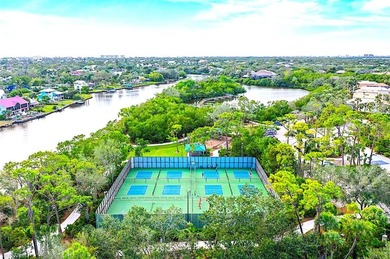 THE ONE YOU HAVE BEEN WAITING FOR! STUNNING POOL HOME WITH WATER on Bonita Bay West in Florida - for sale on GolfHomes.com, golf home, golf lot